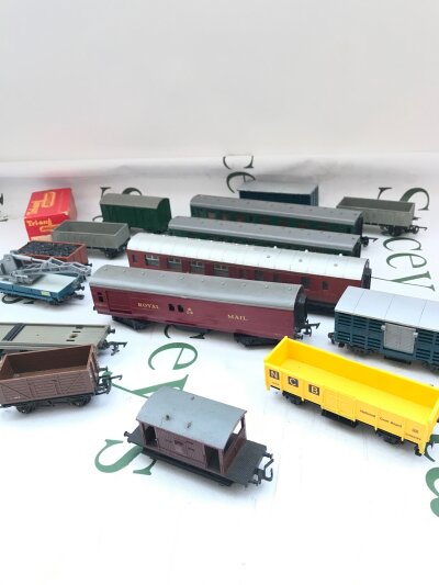 A Box Containing 00 Gauge Coaches And Wagons Etc.
