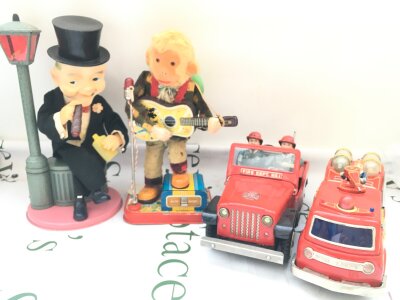 4 Battery Operated Tinplate Toys. A Fire Department Jeep. A Fire Engine, A Rock And Roll Momkey And A Good Time Charlie. No Reserve. From A Lifetime Private Collection To Be Sold.