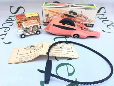 A Boxed Dinky The Prisoner Mini-Moke #106 stickers Has Come Off and Damage To Canopy. And A Pink Panther #354. Both In Repro Boxes.