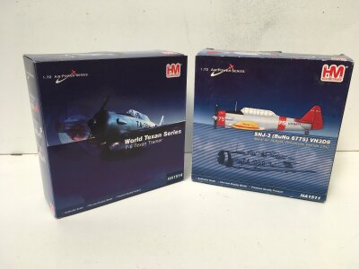 2x boxed HobbyMaster diecast models in the Air Power Series featuring HM1511 SNJ3 and HM1514 T6 Texan Trainer. 1:72 scale.  No reserve. (2)