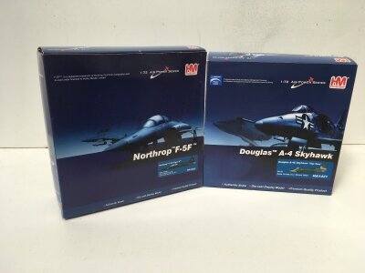 2 boxed HobbyMaster diecast models in the Air Power Series featuring HA3352  Northrop F5F and HA1421 Douglas A4 Skyhawks.  1:72 scale. No reserve.