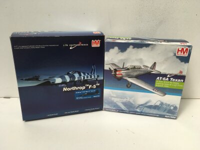2 boxed HobbyMaster diecast models in the Air power Series featuring HA3315 Northrop F5 and HA1504  AT6A Texan.  1:72 scale. No reserve
