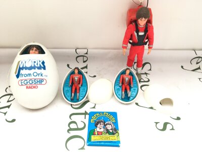 A Collection of Mork And Mindy Toys Including A Eggship Radio.