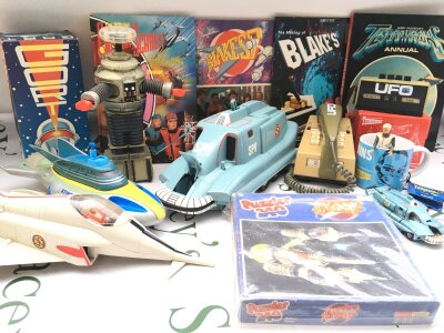 A Collection Of Various boxed And Loose Toys Including A Boxed Gort. Annuals. Jigsaw etc.