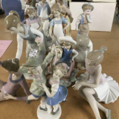 A collection of eleven figures including Lladro.