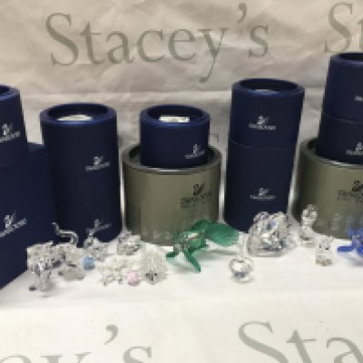 Boxed Swarovski crystal glass figures including cats, fish, swans etc . Postage category C