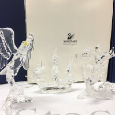 Boxed Swarovski Crystal glass figures including bald eagle, Santa Maria ship, tropical fish group (one fish loose). Postage category C