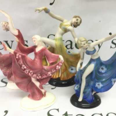Four Art Deco figures of ladies, tallest approx 27cm. Shipping category D.