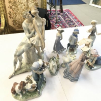 A collection of Lladro porcelain figures including Harlequin and ballerina, Susan, Parisian lady etc. this lot cannot be posted