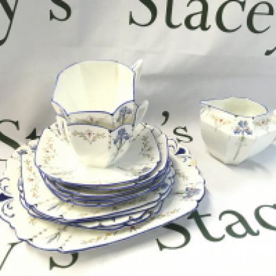A Part Shelly tea set including saucers and cups. Some damage