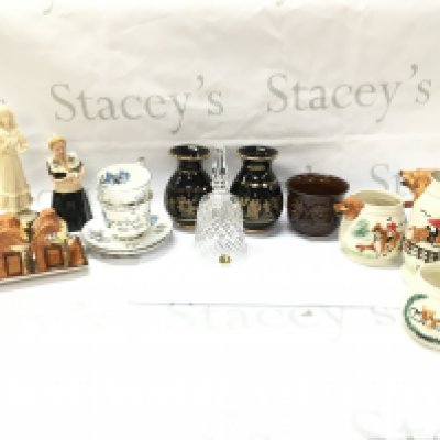 A collection of ceramics including Bols ceramic figure, Spathas Keramik vases, fox hunting jugs , Royal Stafford silver wedding cups and saucers. This lot cannot be posted
