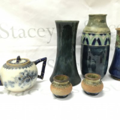 A collection of Royal Doulton stoneware vases and a Doulton Burslem US patient blue and white floral and gilt tea pot . This lot cannot be posted