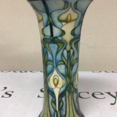 A Moorcroft vase with signed base dated 2001 no obvious damage or restoration. Height 26cm.