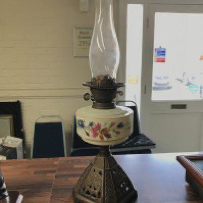 An oil lamp with funnel. No reserve