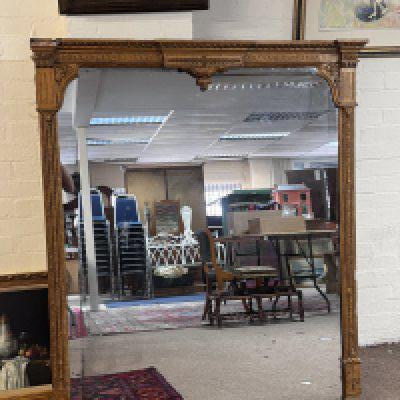 A large gilt framed Victorian over mantle mirror. 146.5 x 124cm (A)