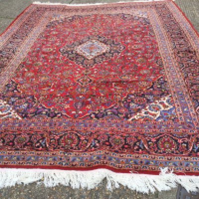 A large Persian carpet, approx 4.2 metres x 2.98 metres. Shipping category D.