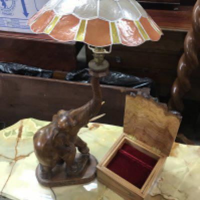 Modern walnut box with fitted interior and carved elephant lamp. This lot cannot be posted