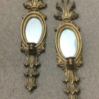 A pair of mirrored gilt wall sconces, approx height 72cm. Shipping category D.