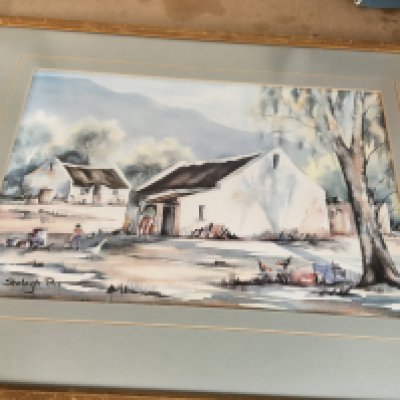 A pair of framed water coulors depicting contry side cottages signed by shelagh price 42cm by 30. NO RESERVE