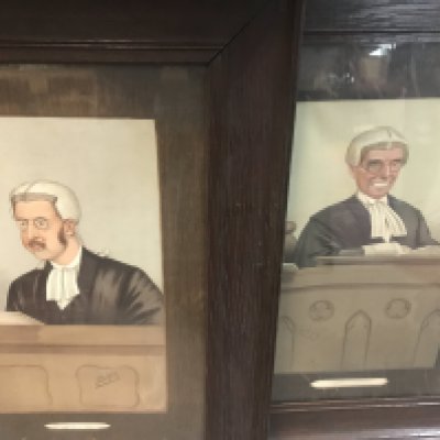 A collection of framed and unframed spy prints. Including cricket players and lawyers.