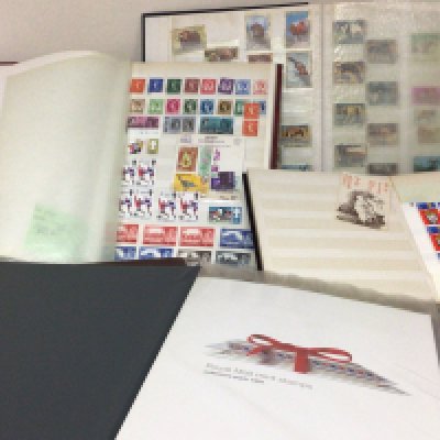An album containing Royal Mail Year Packs 1991-2002 not complete an album of presentation packs and other stamp albums British and world stamps used and unused.