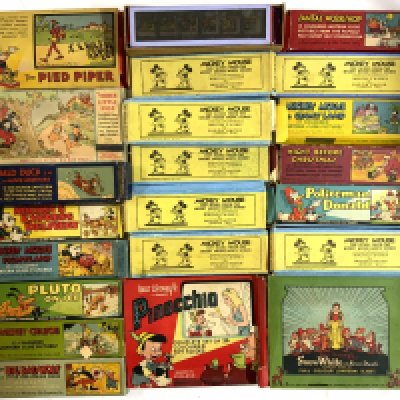 A collection of Disney magic lantern slides together with a home made magic lantern projector. (D)