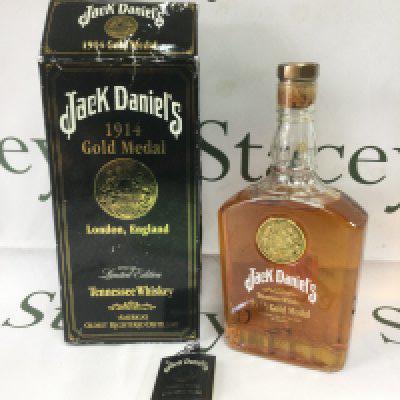 A boxed 750ml bottle of Jack Daniel's 1914 Gold Medal issued Whiskey including original tag. Shipping category D.