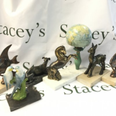 A collection of figures on plaques including a horse, grey ground , fish etc. postage category C