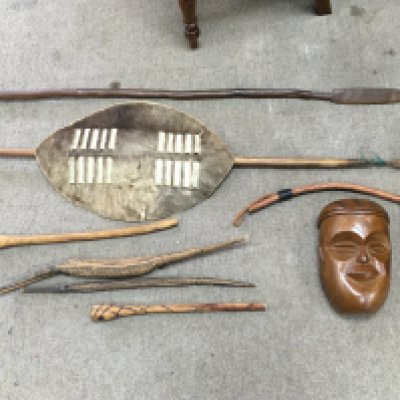 Tribal including a mask, spears, wooden crocodile figures etc. this lot cannot be posted