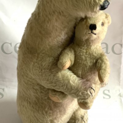 Deans Rag Book Company polar bears, Ivy and Brumas, circa 1949, white mohair plush, both with original labels, largest 46cm. The bears were modelled after the London zoo exhibits, Brumas born in 1949 was the first polar bear to be born in British captivity.(b)