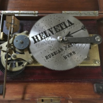 WITHDRAWN - A small mahogany musical box .