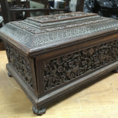 A carved ornate Sandalwood box with inner compartments. Dimensions 26x16x17cm . Postage category B