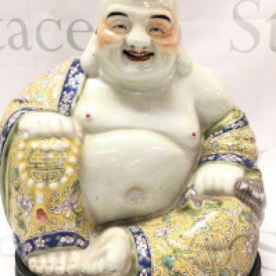 A Chinese ceramic Famille Rose Buddah figure, 25cm tall. Some chips in the paintwork. This lot cannot be posted