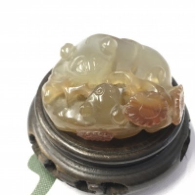 A small Chinese hardstone figure group, two rats with flowers . Postage category A