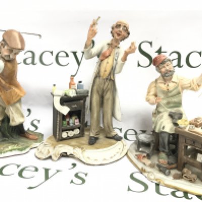 Three Capodimonte figures including The Cobbler, The Golfer etc. 23 to 29cm tall approximately. This lot cannot be posted