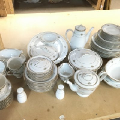 A Noritake dinner set including plates, dishes, cups etc. this lot cannot be posted