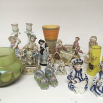 A collection of late 19th and early 20th century ceramics and glass including two Victorian nodding head seated figures art glass and a Shelley vase. NO RESERVE