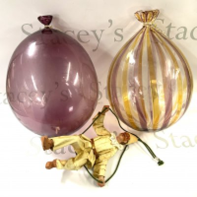 Livio de Marchi, 2 hanging glass balloons with a suspended figure of a clown (both ballloons signed Livio De Marchi for Mare Seguso Vizo Murano. each approximately 13.5&acirc;. (D)