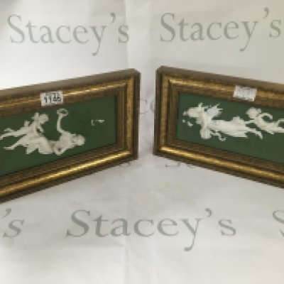 Two ceramic plaques and an Italian ceramic framed mirror.