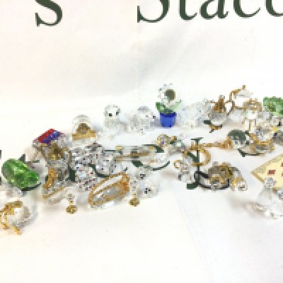 A collection of boxed Swarovski Crystal glass figures and ornaments, no obvious damage or restoration. This lot cannot be posted