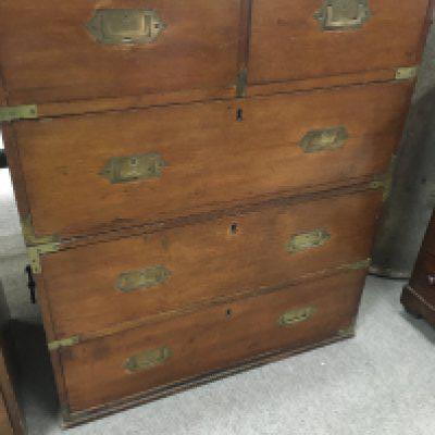A small brass bound mahogany campaign chest fitted with two short and two long drawers. 75 cm x 45 cm .
