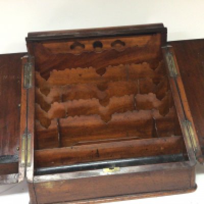 An Early 20th century walnut stationery box with a well fitted interior. NO RESERVE