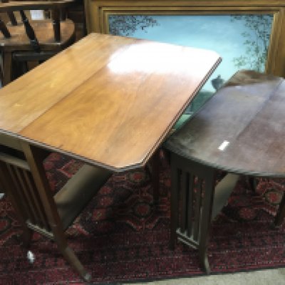 Two Edwardian walnut Sutherland tableswith drop flap sides (2)