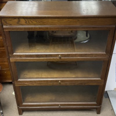 An oak three tier Globe Wernicke style bookcase by Angus , dimensions 31x87x123cm