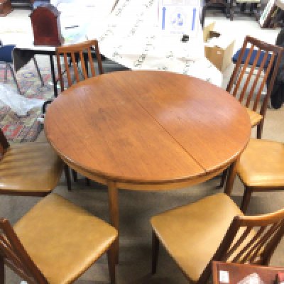 A G-Plan dining table and chairs. Table dimensions 72cm tall, width 120