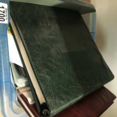 A box containing Channel island stamps. NO RESERVE