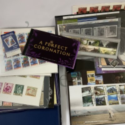 An album of mint Queen Elizabeth 2nd stamps and presentation packs. (C)