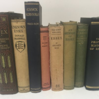 A box containing a collection of books mainly books about the county of Essex.