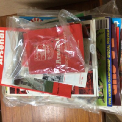 A collection of vintage football magazines includes Sport Weekly magazine, Charles Butchans Football monthly, a few boxing magazines etc