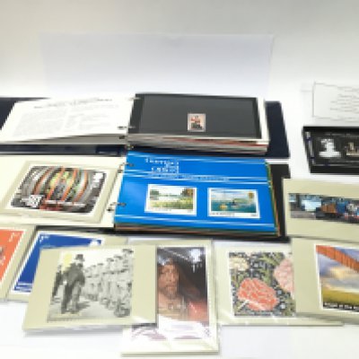 A Limited Edition queen's diamond jubilee jersey post miniature sheet along with large collection of royal mail stamp cards and other stamps. Postage B